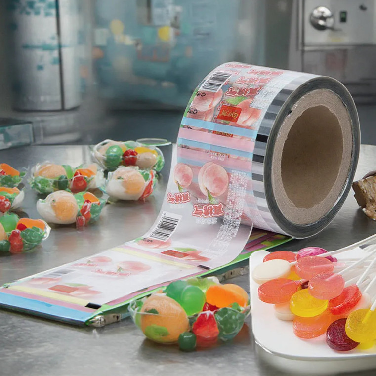 การพิมพ์ตามสั่ง กระเป๋าบรรจุกลมหนังกลมอาหาร เกรดอาหาร PE Bopp Candy Lollipop ช็อคโกแลต อาหารอัตโนมัติบรรจุกลมหนังกลม